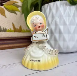 Vintage 1956 Napco August Birthday Girl Bell Figurine - Read
