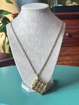 Gold Tone “deep” Locket Necklace