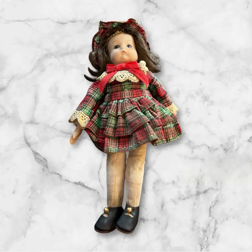 Vintage Porcelain Doll With Brown Hair And Red And Green Plaid Dress