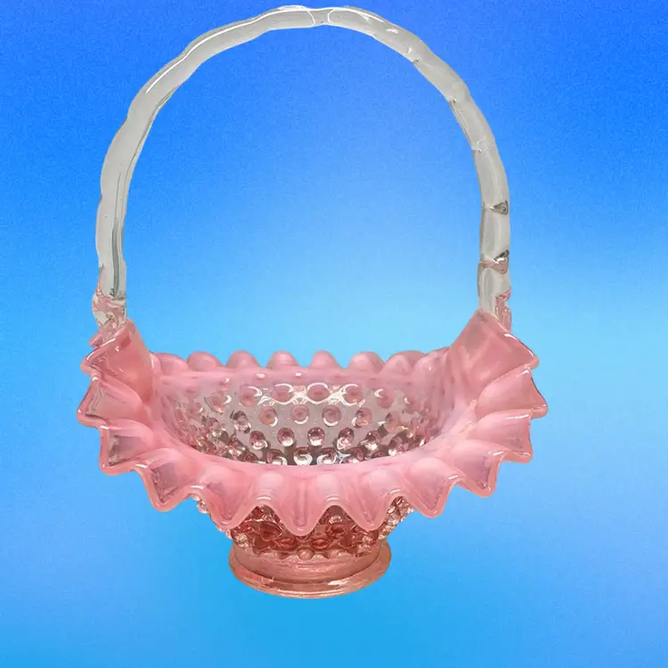 Fenton Cranberry Opalescent Hobnail Basket

8” Tall X 7 1/4” Wide
