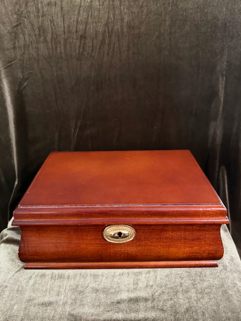 Beautiful vintage wooden jewelry box with beveled mirror and velvet lined compartments