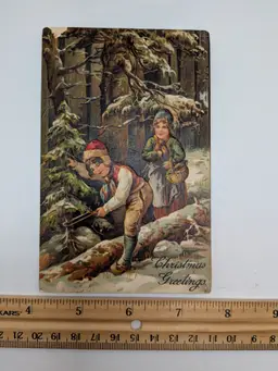 E17. Antique embossed chromolithographic Christmas postcard Germany PFB No 7143 Christmas Boy Cutting Tree Hand Saw Handsaw c1910 Postcard