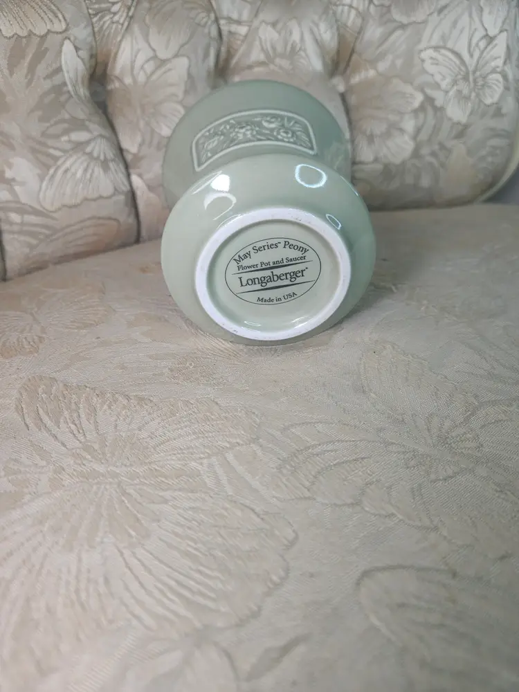vintage Longaberger 2001 May Series Peony flower pot in sage green with an attached saucer.