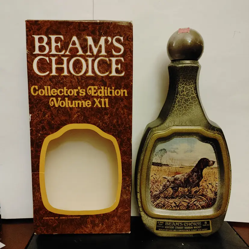 Jim Beam's Collector's Edition Vol XII Whisky Decanter. Empty. Features a German Shorthaired Pointer by James Lockhart. 11.5 inches high. No chips or cracks.
