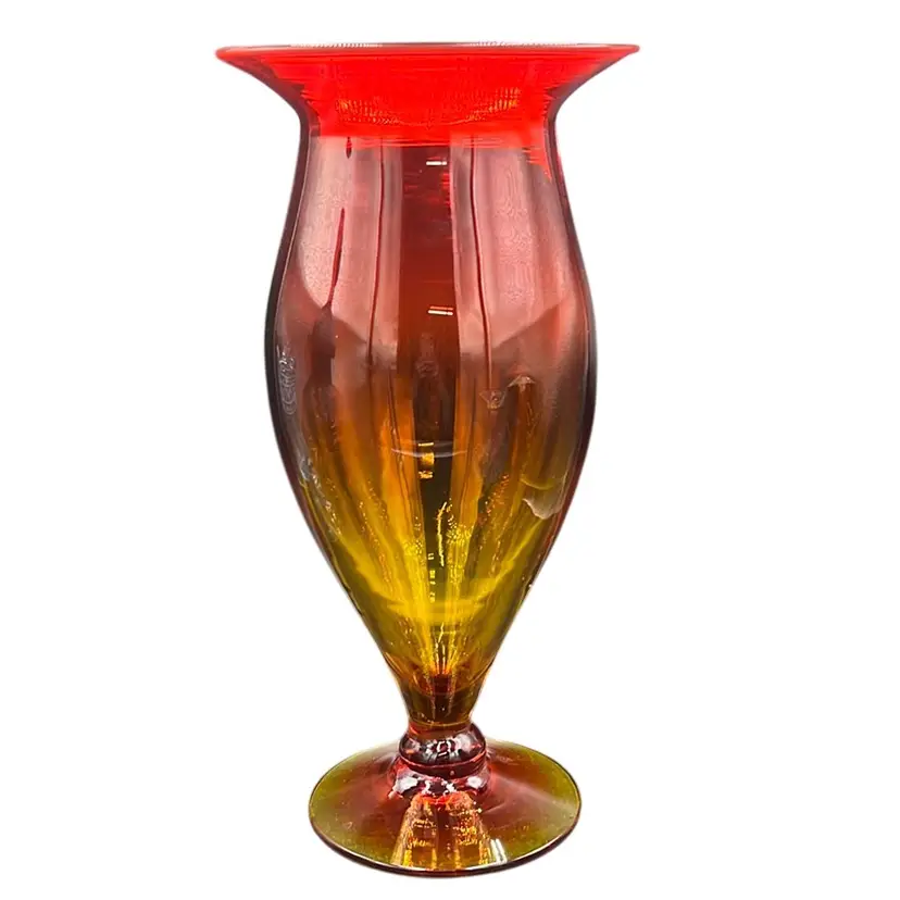 Vintage Blenko Hand Blown art glass footed vase in amberina glass. 11.5” Tall