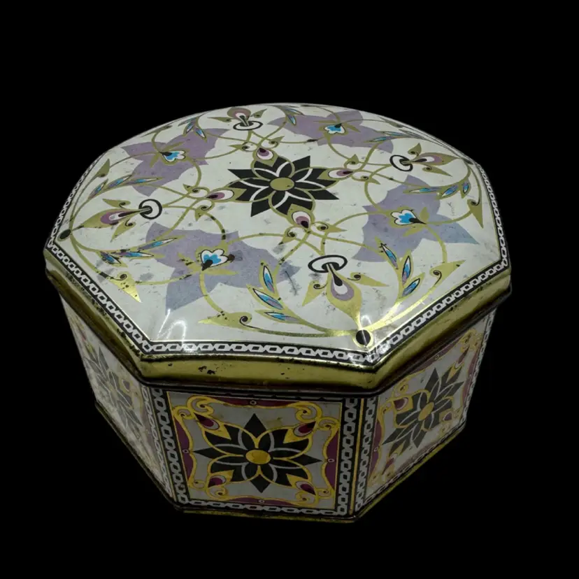 Vintage octagonal tin box with Art Deco floral and geometric graphics Made By Meister In Brazil