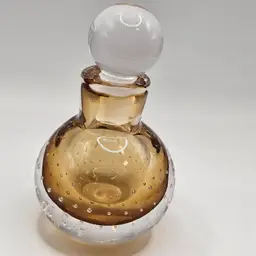 Glass perfume bottle amber bullicante with stopper