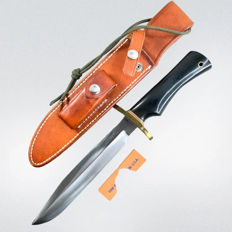 1991 Vintage Randall Collectible Hunting Knife. Model #1 Style. 8" Blade. 13” Overall Length.    Leather Sheath With Sharpening Stone Included.