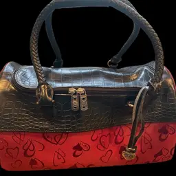 Brighton black crocodile-embossed leather and red heart-patterned duffel bag