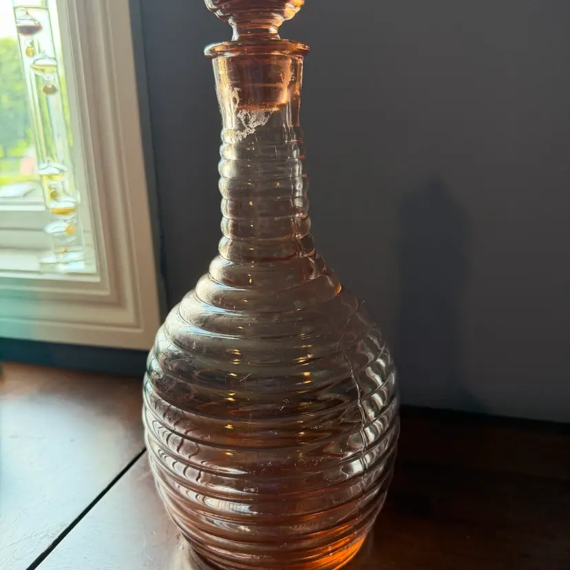 Vintage Pink  ribbed glass decanter with a decorative stopper.12”  Circa 1930S To 1950S
