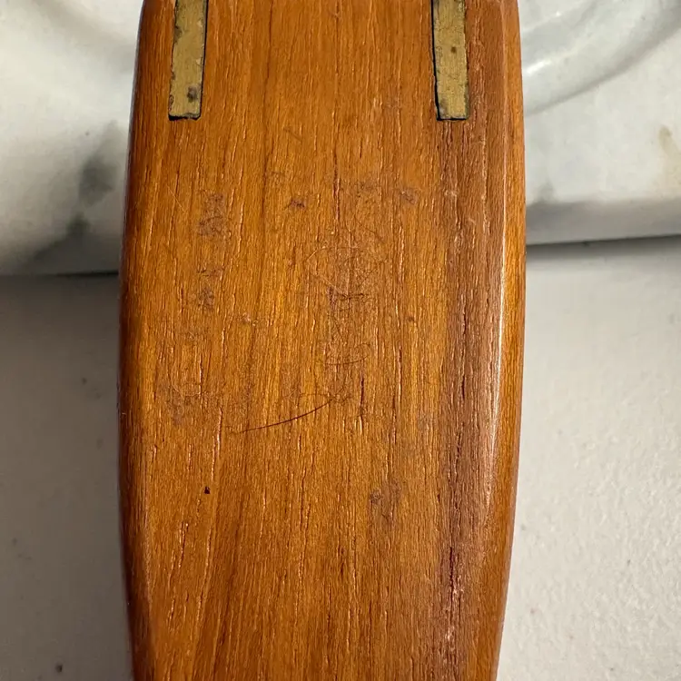 Vintage Mid-Century Modern nutcracker made of wood and brass