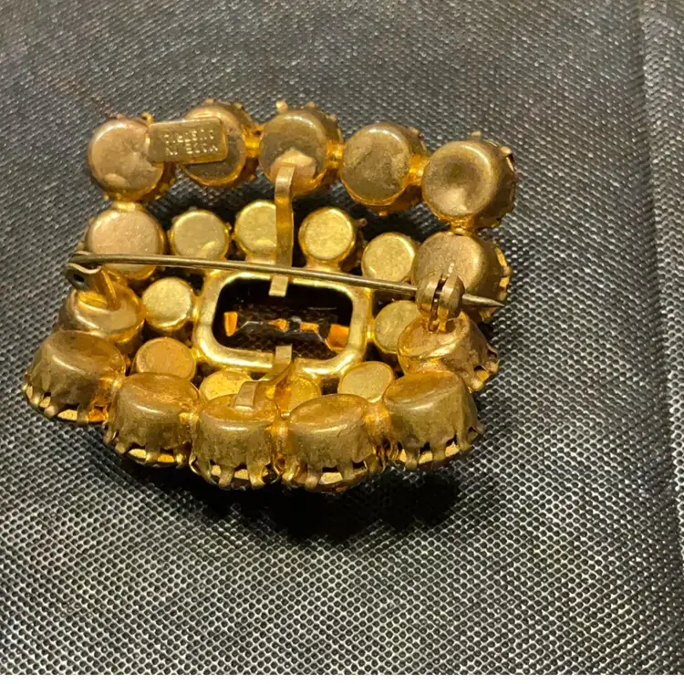 VTG Olivine And Amber Rhinestone Brooch Made In Austria. Measures 1.75” X1.5”