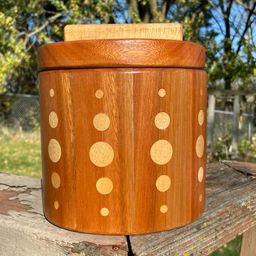 Handcrafted, Mixed Woods, Lidded Canister. Marked: Made In The USA By Kevin Rousseau. 6”h.