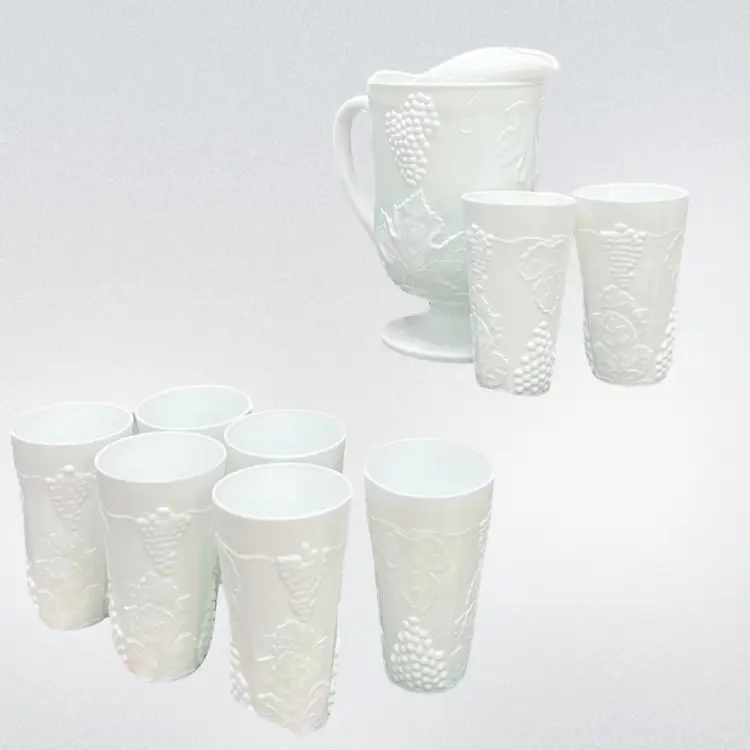 Milk Glass Beverage Set 
Pitcher & 8pc Tumblers 
“Colony Harvest” By Indiana Glass Embossed Grapes and Leaves Pattern