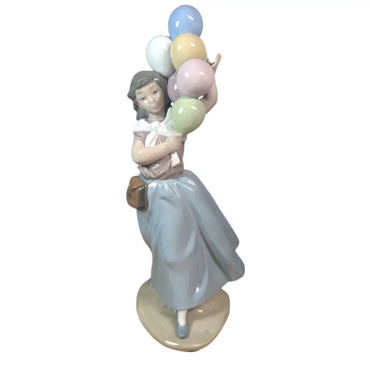 Lladro retired “Balloons for Sale” 5141 Girl Selling Balloons