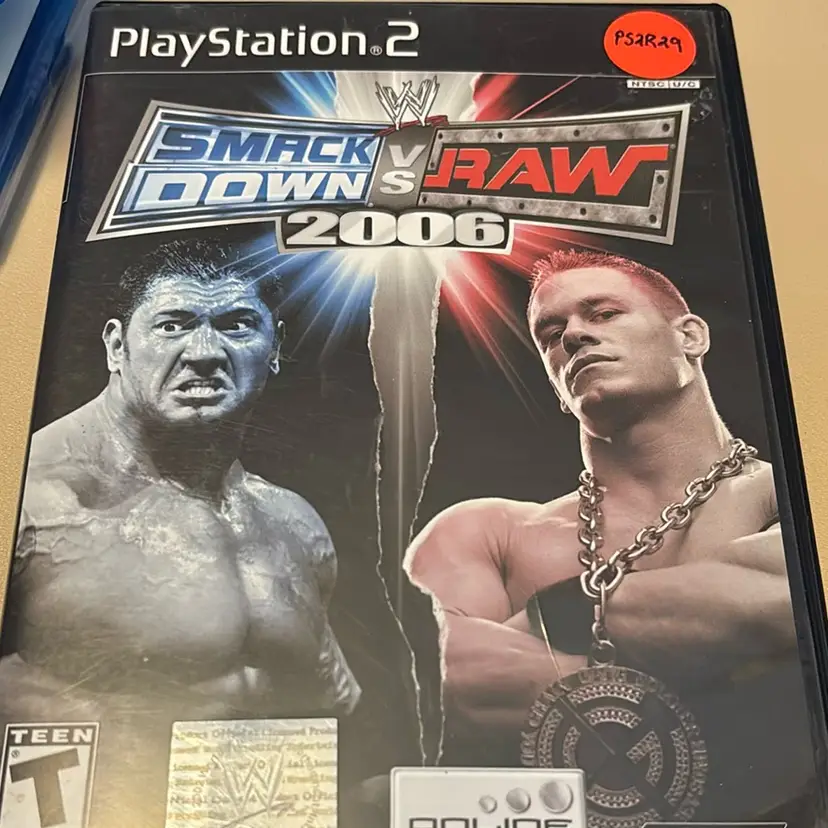 PS2 Complete In Case- WWE Smackdown vs Raw 2006 - Resurfaced
