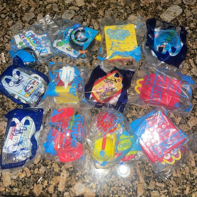 Lot Of 12 McDonald’s Happy Meal Hasbro Gaming Toys Mint In Packages