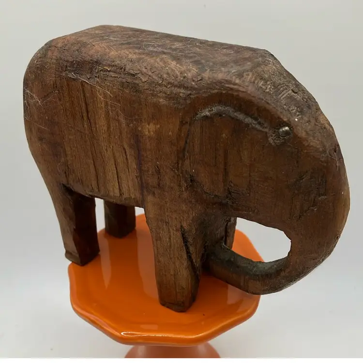 Carved Rustic Wood Elephant With Metal Eyes
