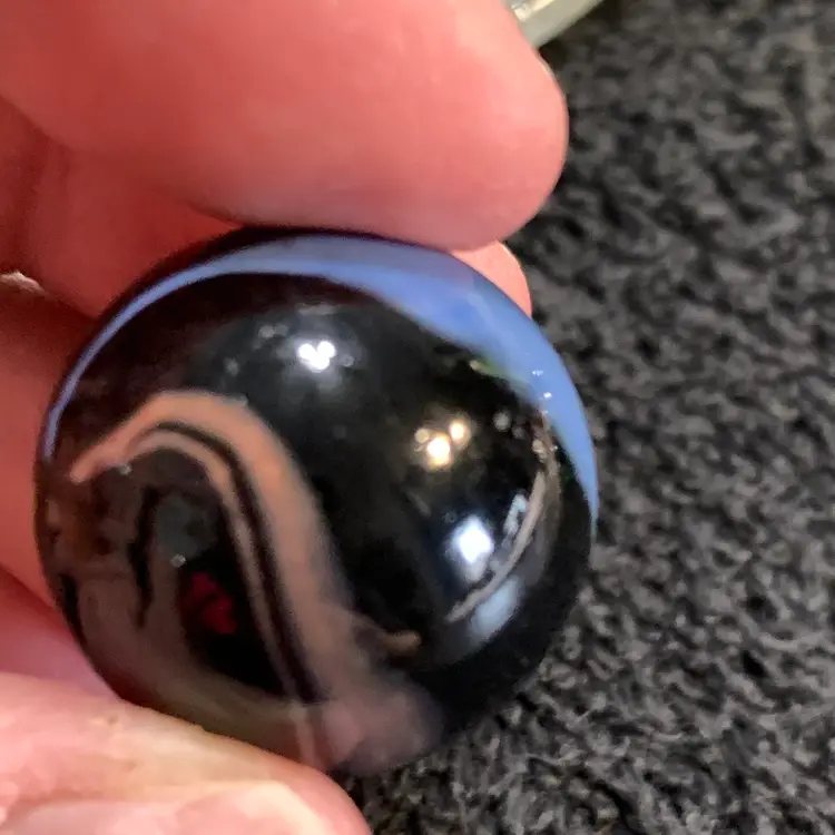 Black w/Yellow, Blue & Orange Swirl Glass Marble 1"