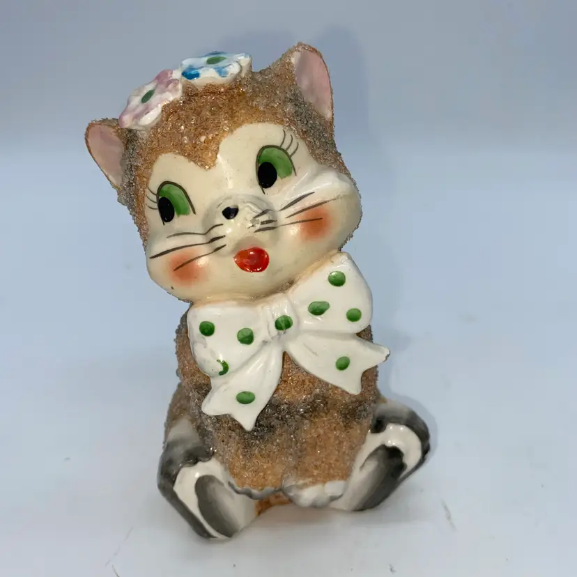 #1441 Vintage Arnart ceramic glitter Sugared cat figurine with floral headpiece and polka dot bow.