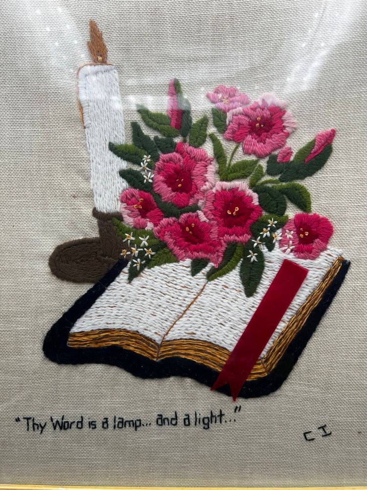 #488B Vintage Framed Handmade Embroidered  Crewel Picture Of A Bible With A Bouquet Of Pink Flowers And A Candle To The Side. The Scripture ‘Thy Word Is A Light… And A Lamp’ Across The Bottom.