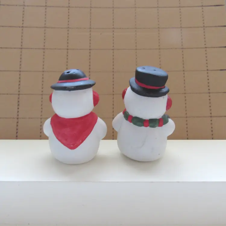 Bisque Snow Couple Salt and Pepper Shaker Set