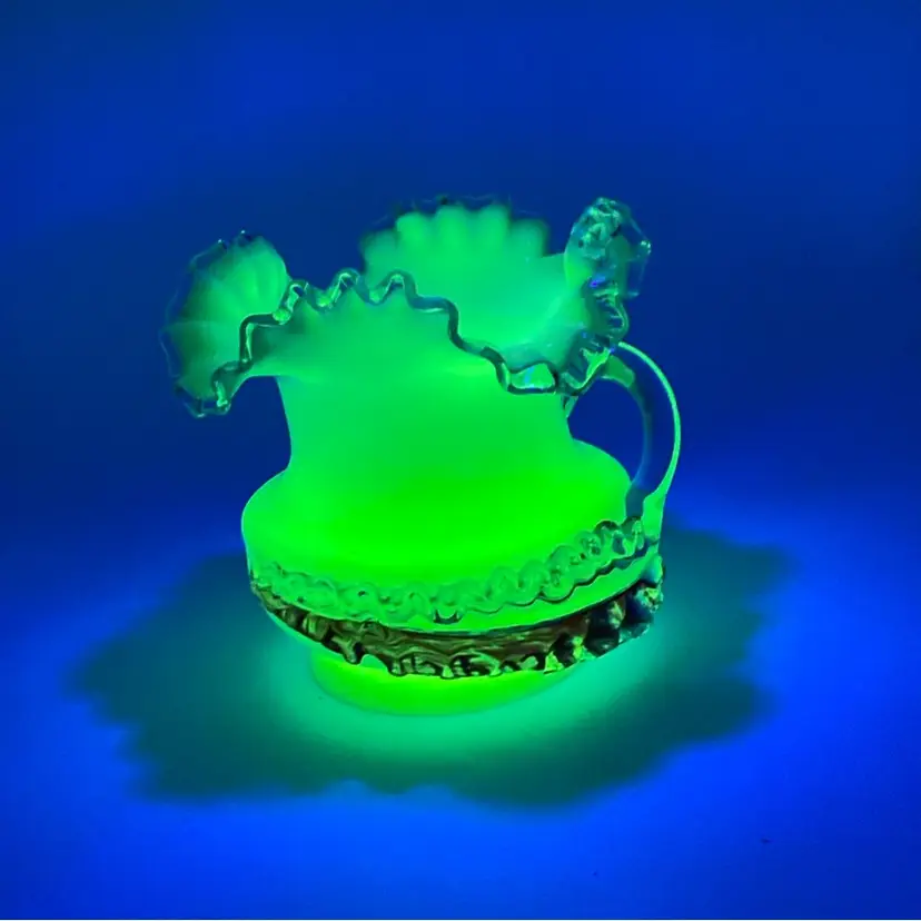 #0424 Very UV reactive Stevens & Williams rigaree glass pitcher with ruffled rim.