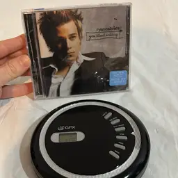 Discman & Sealed CD