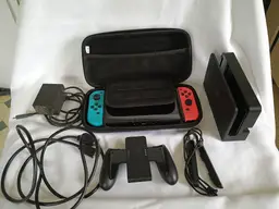 Nintendo Switch OLED console w/ accessories Inc Hogwarts Legacy gamecase. And Hogwarts Legacy game.
