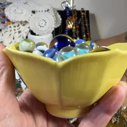 Yellow Petal Dish Full Of Marbles