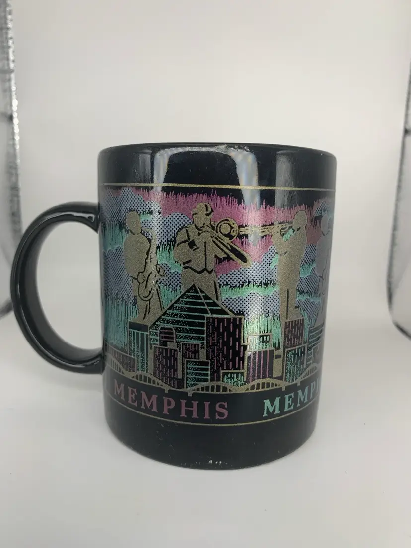 Memphis Souvenir Mug with Memphis Skyline and Musicians Playing Instruments, 4 3/4β x 3 7/8β x 3 1/4β.
