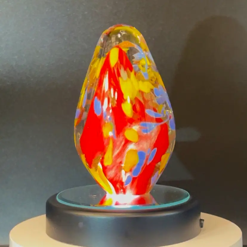 #187- Glass Egg Paperweight 
Blue Red & Yellow Art Deco
4"Tall    1lb 1oz.