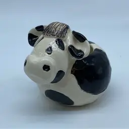 #4912 Signed hobby art piece of a cow planter, dated 1993.