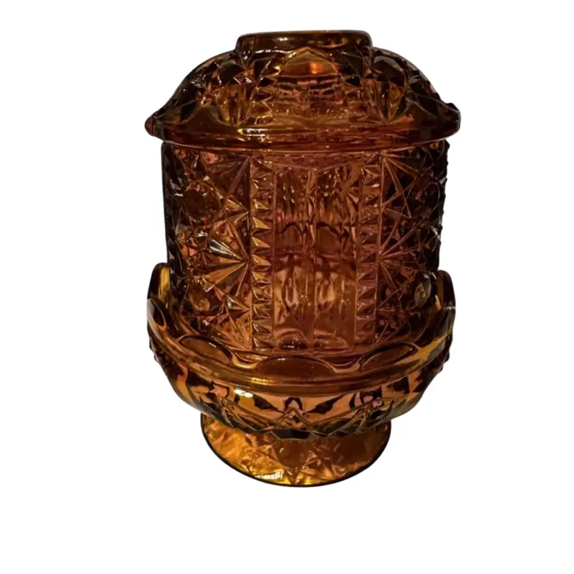 Vintage amber glass fairy lamp in the "Stars and Bars" pattern, produced by the Indiana Glass Company