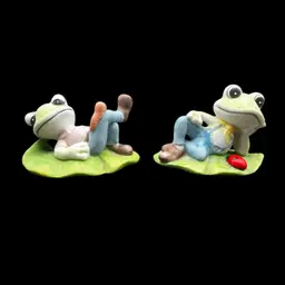 #268A Vintage Pair Of HOMECO #1447 Ceramic Country Frogs Relaxing With Their Bug Friends.
One Has A Caterpillar, The Other Has A Ladybug