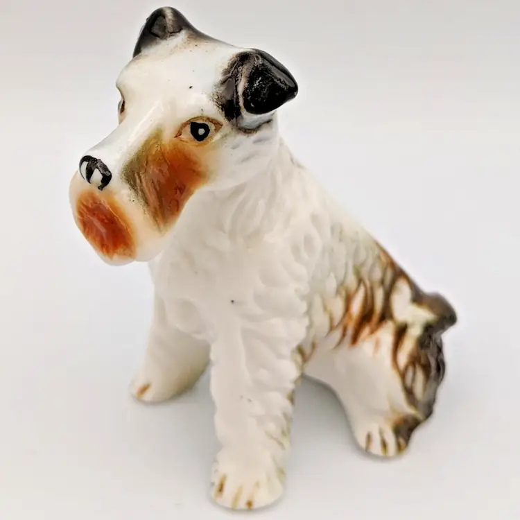 Vintage White Porcelain Sitting Airedale Wire Hair Fox Terrier Dog Figurine