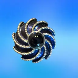 Vintage Avon Silver Tone   Blue Enamel Silver Tone Swirl Round Light Reflective Cab In Center