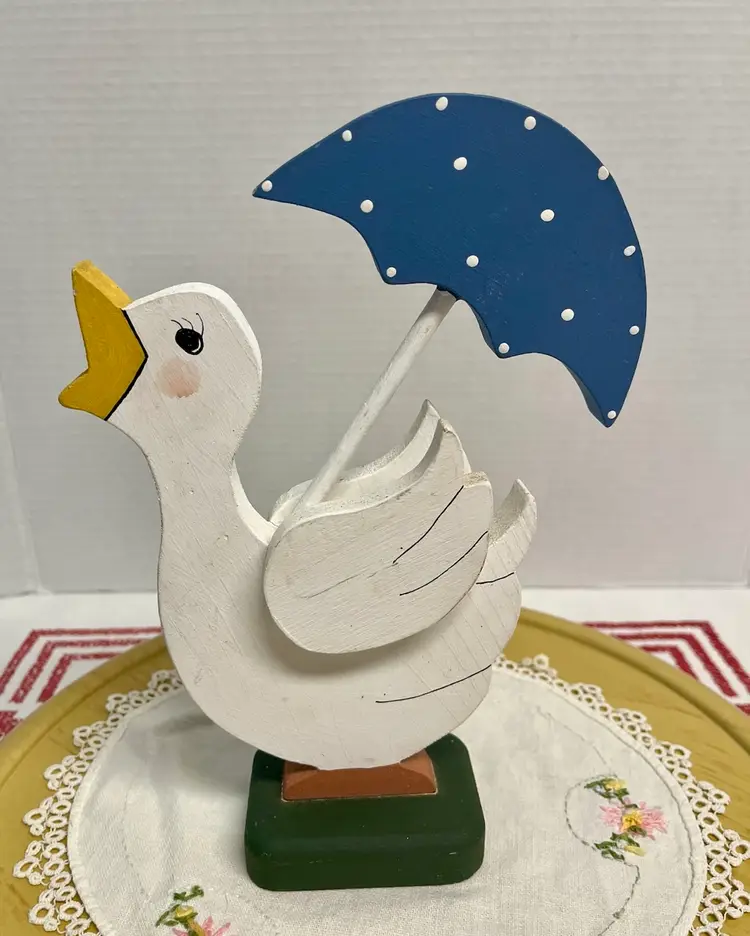 Vintage 1990’s wooden folk art goose holding umbrella figurine shelf sitter