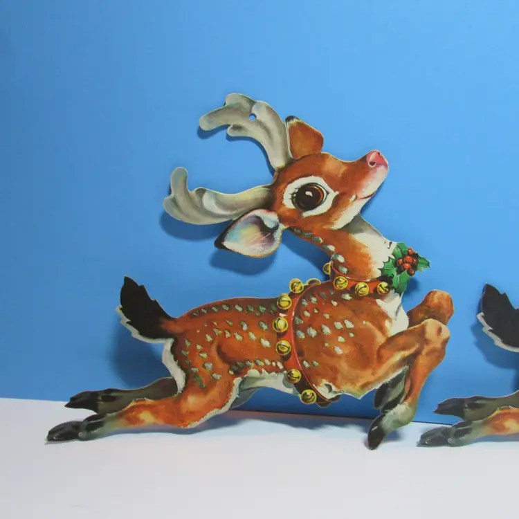 set of 3 vintage Santa's flying reindeer cardboard cut outs 6 1/2"