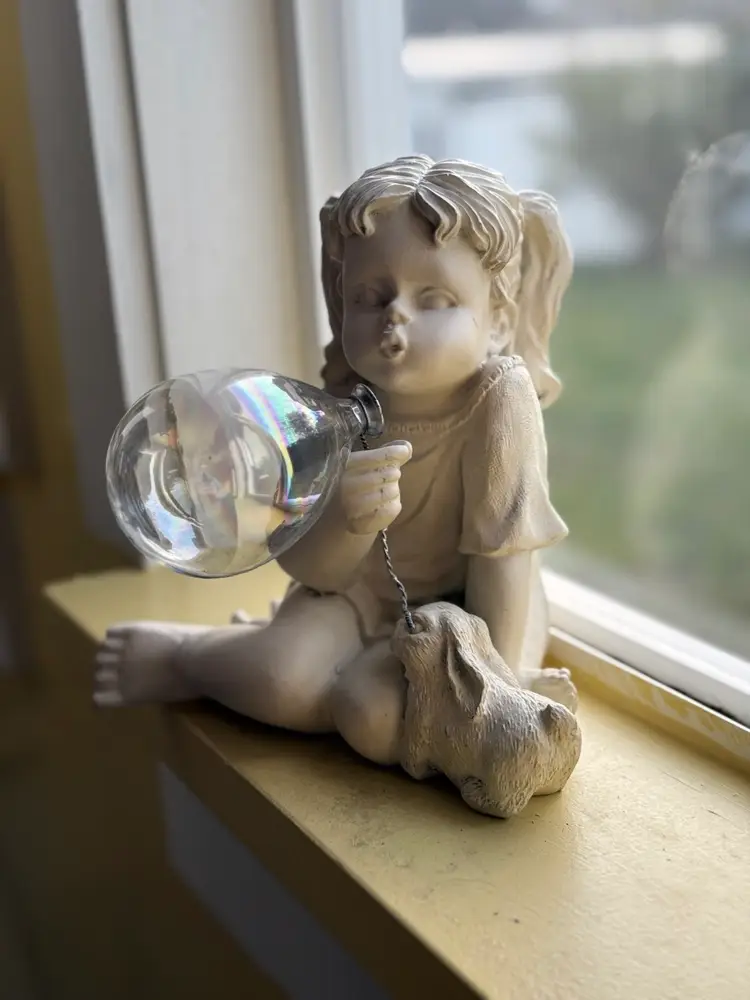 Decorative garden statue Girl Blowing a Bubble