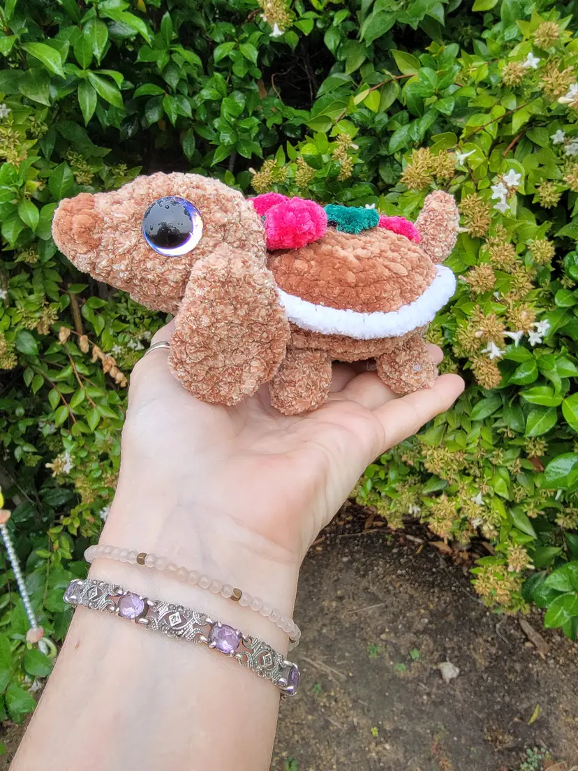 Crocheted gingerbread dog and cupcake