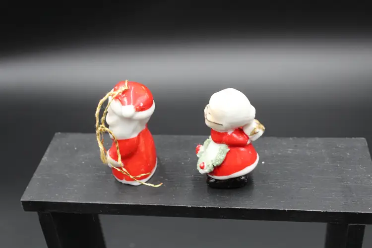 Porcelain Santa Bell and Mrs. Claus, not a matching set but look great together