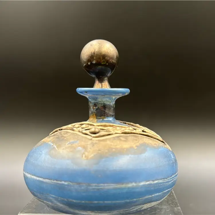 #01 Perfume Bottle With Stopper, Blue Tone With Silver In Tone Accent. Possibly made in Israel has no makers Mark. could not find it anything like it rare peace.