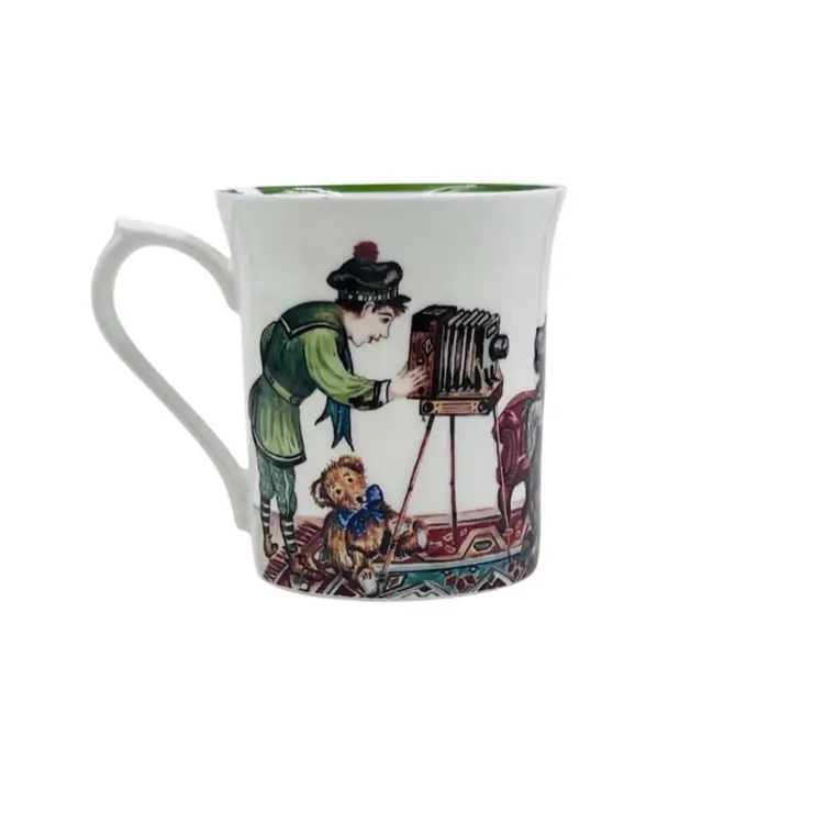 CHILDRENS TEA CUP 
MONDAYS CHILD 
By Churchill Queens Fine China