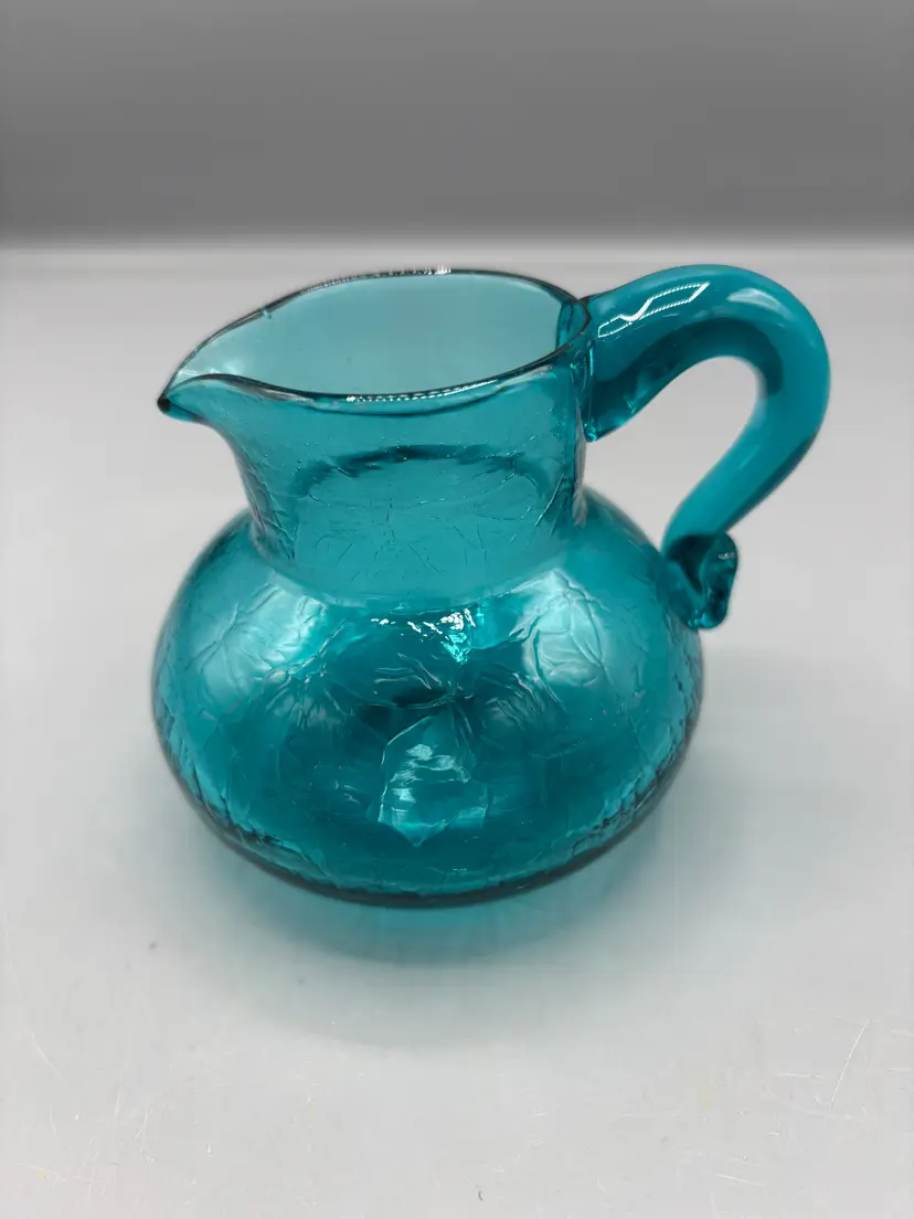 Teal hand blown textured glass pitcher