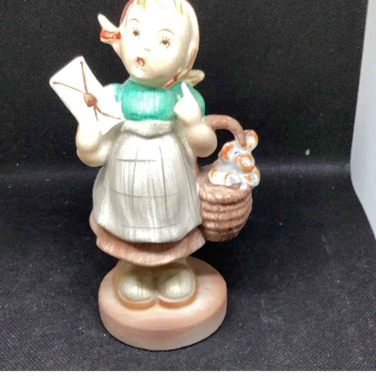 Hummel like little girl signed on the bottom with sticker sphinx