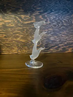 Frosted glass bird figure with clear base