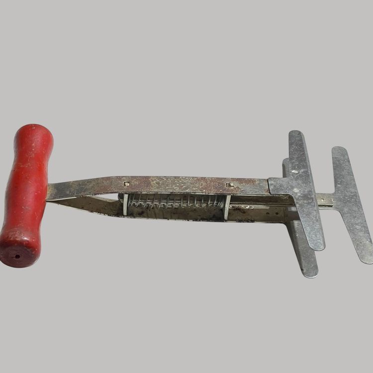Vintage Foley stainless blades red wood handle chopper 8 inches.