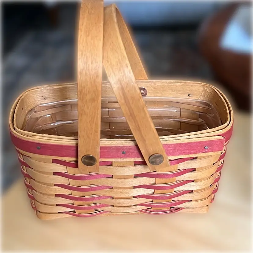 Vintage Longaberger 7” Long, 5” Tall Double Handle Mini Basket With Rustic Red Accent Color And Plastic Liner Handwoven With Brass Fasteners. Made In Dresden , Ohio Signed And Dated 1998.