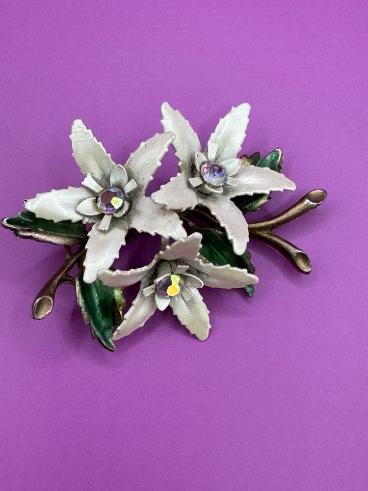 White Flower Brooch with Green Leaves and Aurora Borealis Center